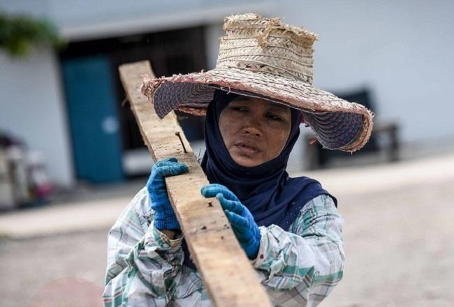 travailleuse migrante birmane en Thaïlande