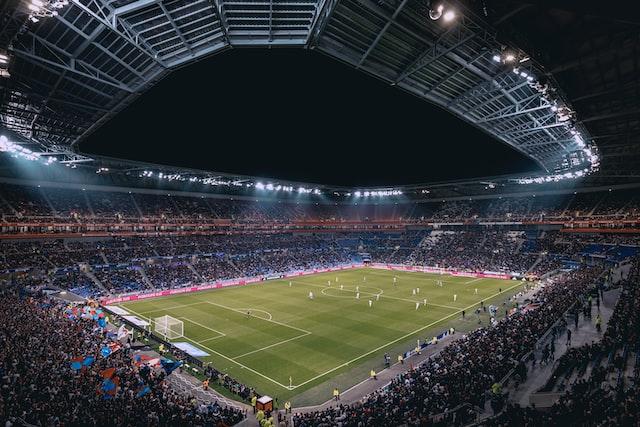 Stade de football © Thomas Serer - Unsplash