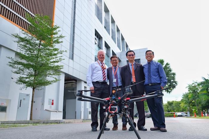 (From left) M1 COO Patrick Scodeller, CTO Denis Seek and NTU ATMRI D...