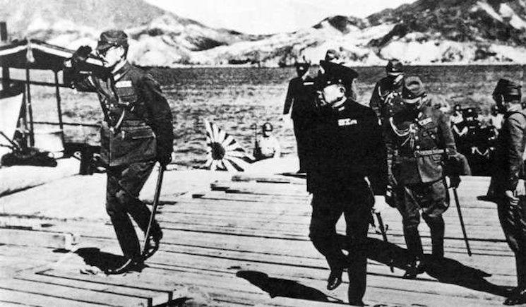 Lieutenant General Takashi Sakai (left) at Quarry Bay pier in December 1941