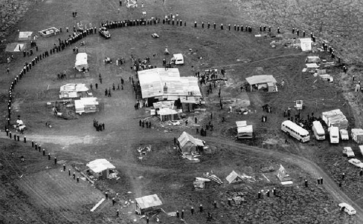 Police encircle protesters ahead of the mass arrests to end the occupation of the disputed land at Bastion Point on May 25, 1978. Photo NZ Herald archive.jpg