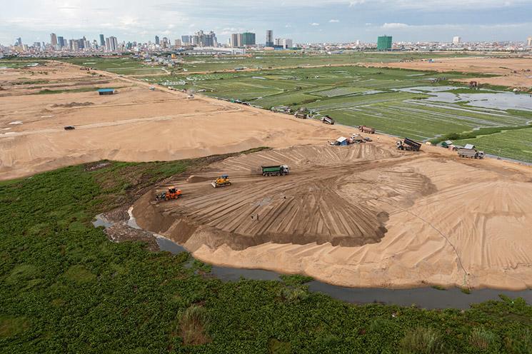 Sand is being used to fill Tompoun Lake to create land for a massive.jpg