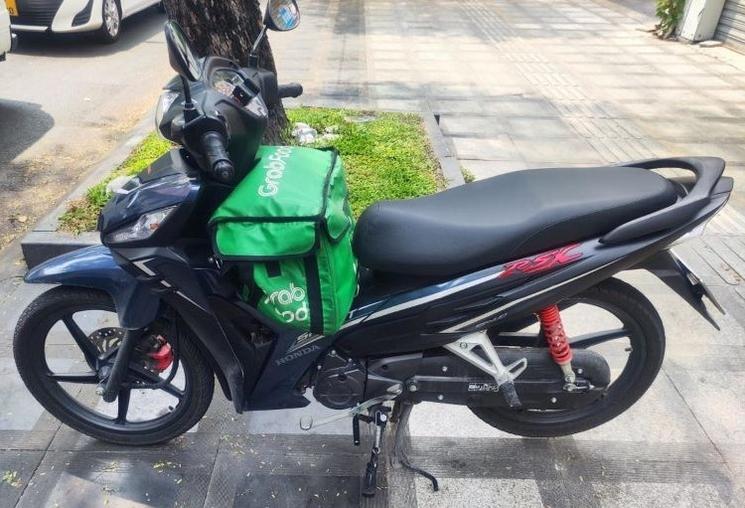 Véhicule moto Grab utilisé au Vietnam